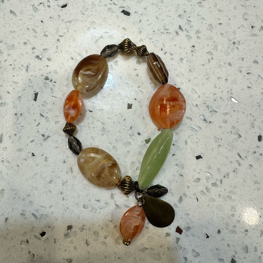 Handcrafted Multicolor Bead Bracelet with Green Accent